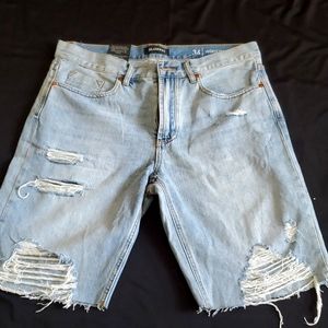Long ripped shorts